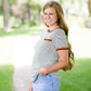 Navy striped tee with a rust accent and front pocket