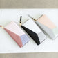 Geometric Zip Wallet in blush, purple, black, peach and mint colors