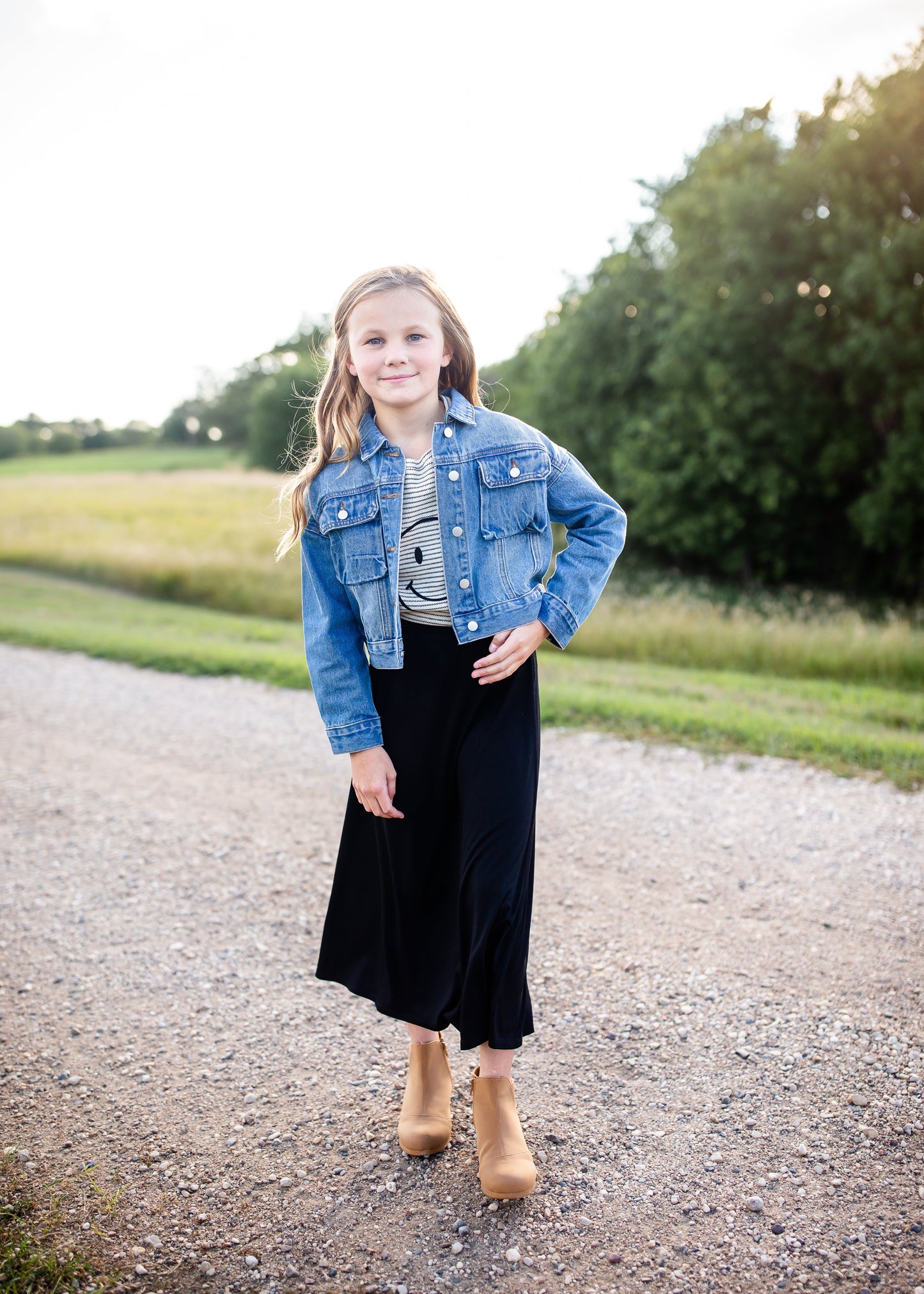 The Girls Clarissa Maxi Skirt is an Inherit Design with a stretch waist for comfortable movement all day long! This skirt is easy to throw on and go as it is super stretchy and made of quality fabric! She's going to love that she can still do all the things while wearing this skirt!