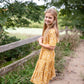 Girls Mustard Floral Smocked Short Sleeve Tiered Midi Dress Girls Hayden Los Angeles