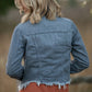 This Gray Fitted Jacket with Uneven Hem is easy to layer over all of your basics! Tailored in a gray cotton blend material, with fully functional front buttons, visible stitching, and a classic collar. The button details continue with at the two chest pockets perfect for holding all the things, and the cuffs also button! There is a raw frayed hem for elevated style! Layer this jacket over your favorite knit dress for classy casual looks all season long! 