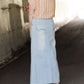 Women's long light wash modest denim-jean skirt.