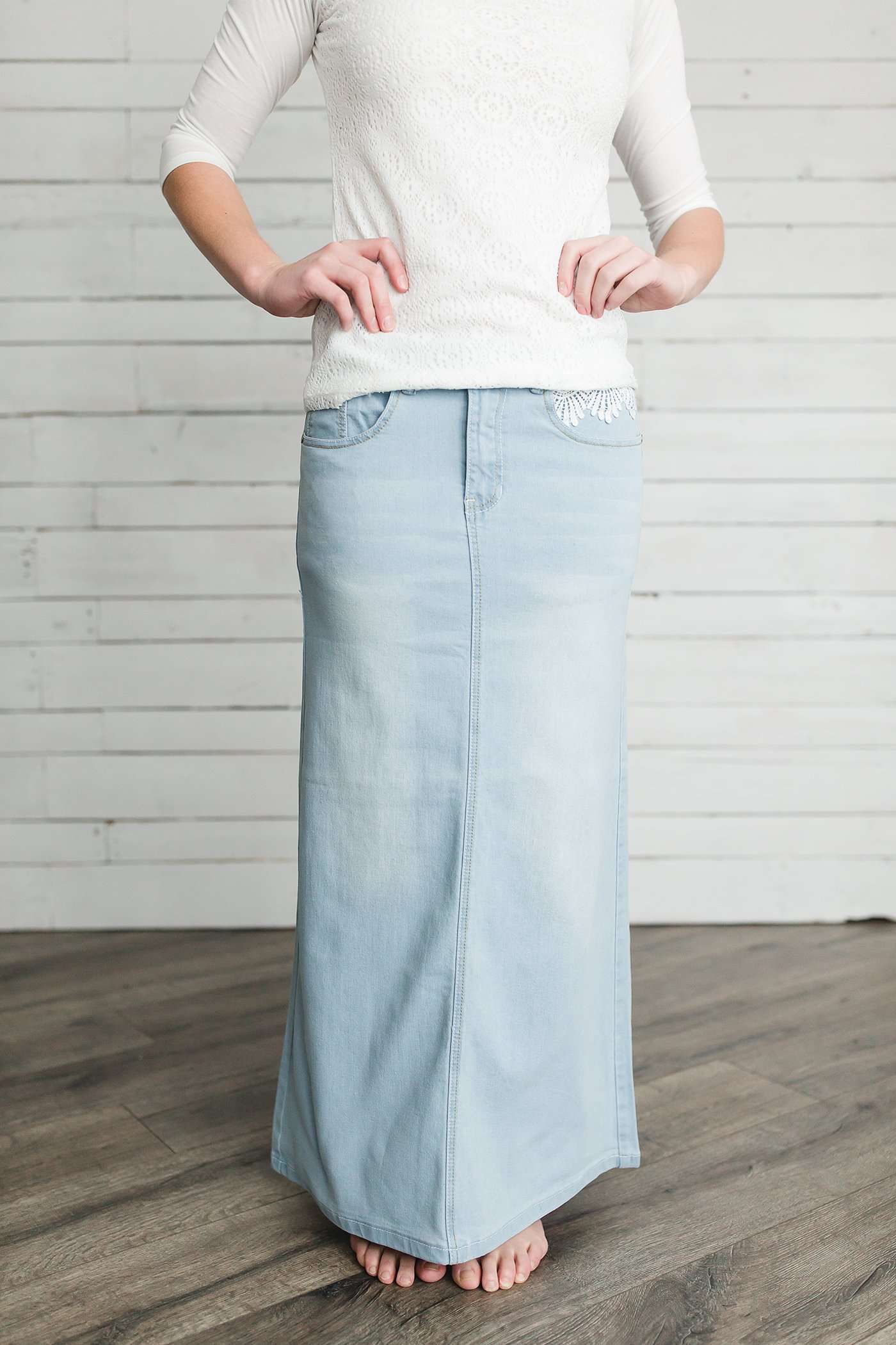 Women's long light wash modest denim-jean skirt.