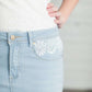 Women's long light wash modest denim-jean skirt.