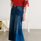 A-line long denim skirt with no slit and a raw edge hem.