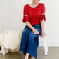 A-line long denim skirt with no slit and a raw edge hem.