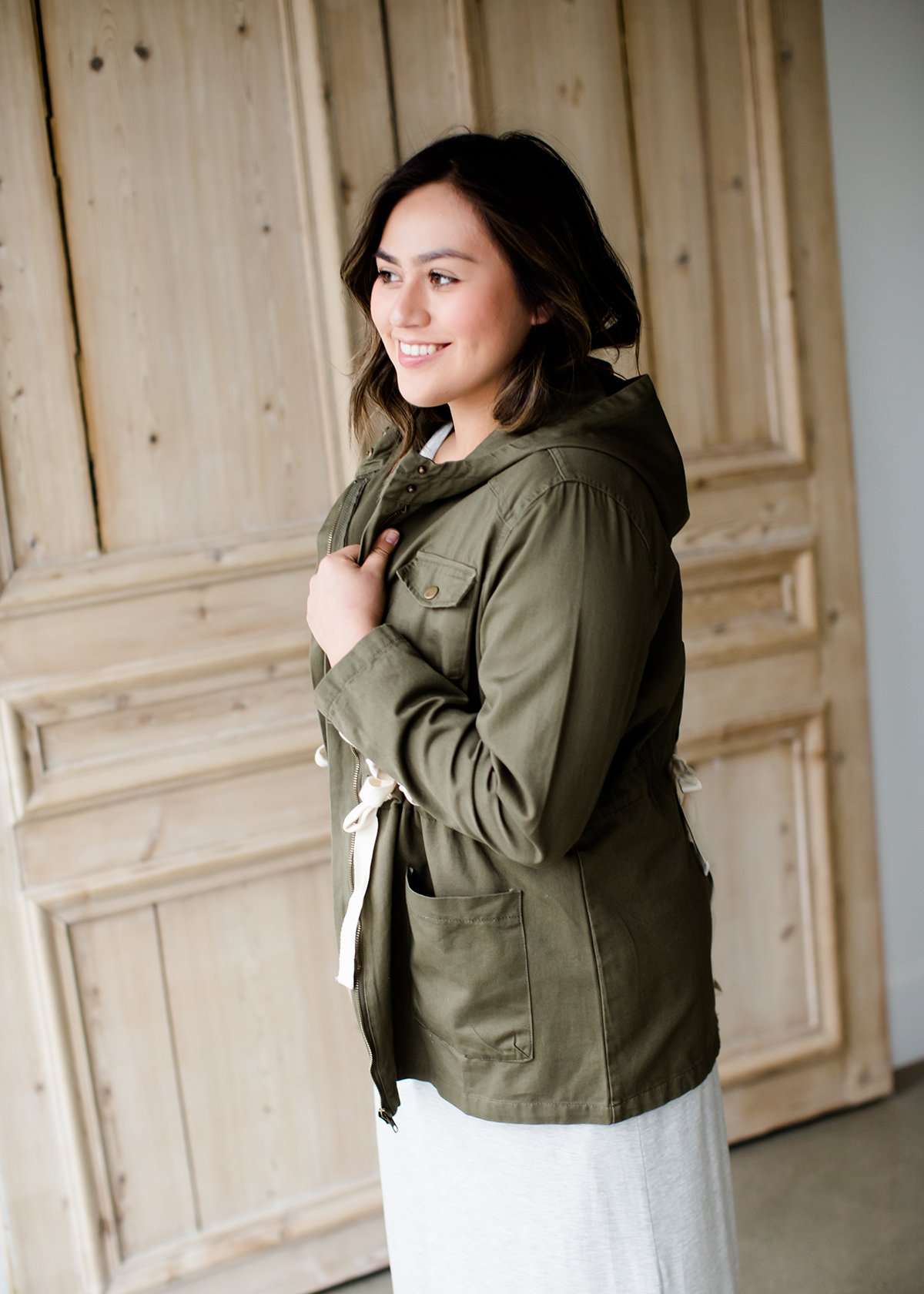 olive green hooded cargo jacket with lace up detail