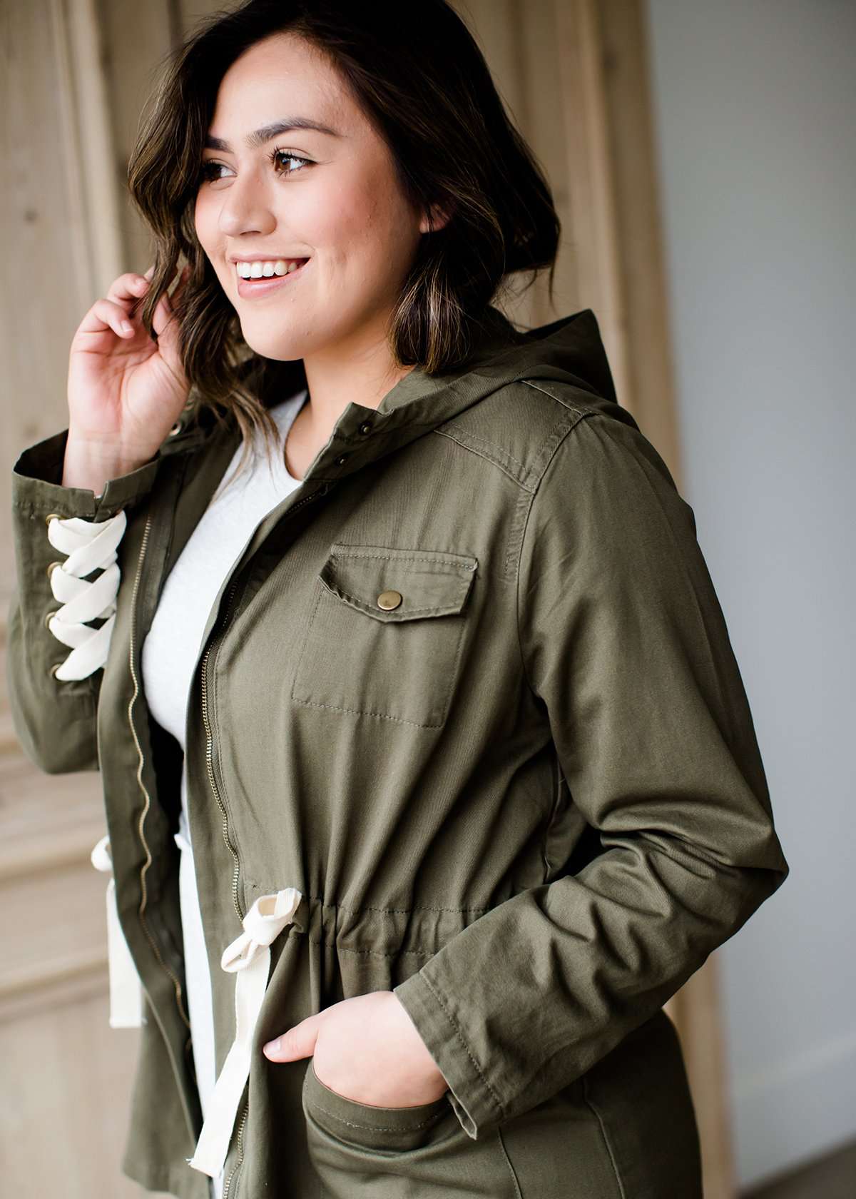 olive green hooded cargo jacket with lace up detail