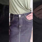 The Beth Dark Wash Long Denim Skirt is an Inherit Design made with you in mind! The dark wash is easy to dress up and details make this a stand out skirt! There is a triple stitch detail on the bottom hem and an Inherit logo patch on the back waistband! A straight fit with a slit in the back makes this long denim skirt super easy to move in and to pair with any tops!
