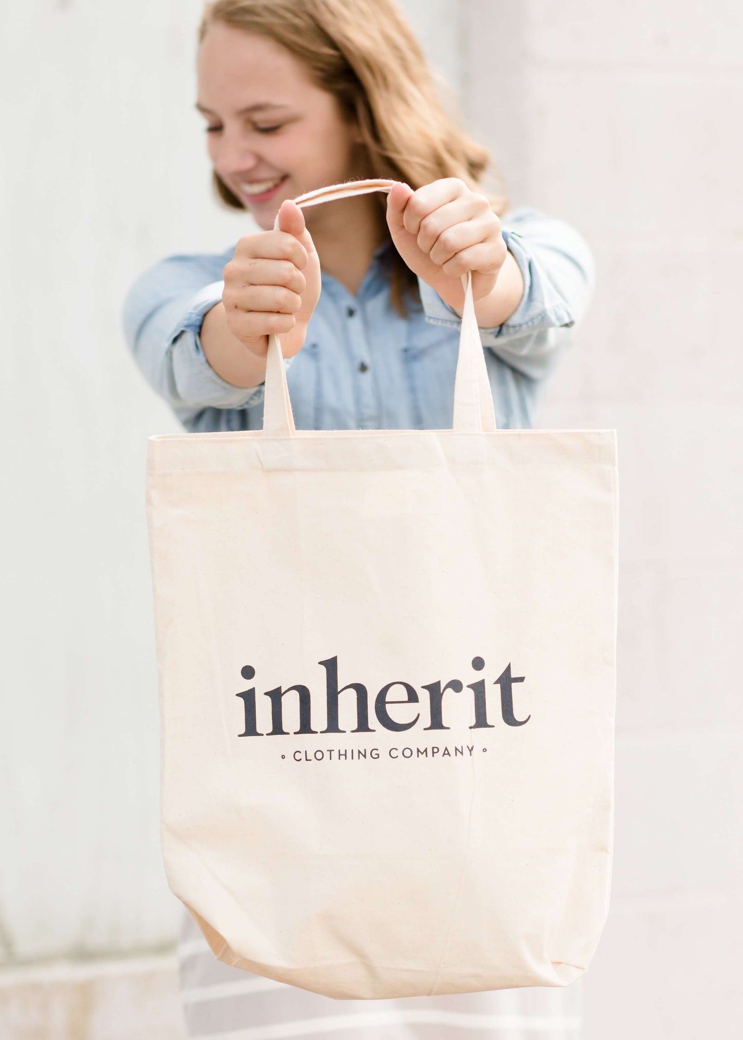 Cream cotton canvas tote with Inherit logo.