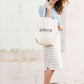 Cream cotton canvas tote with Inherit logo.