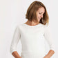 Woman wearing a three-quarter sleeve modest lace top in white, gray, black, navy and wine!
