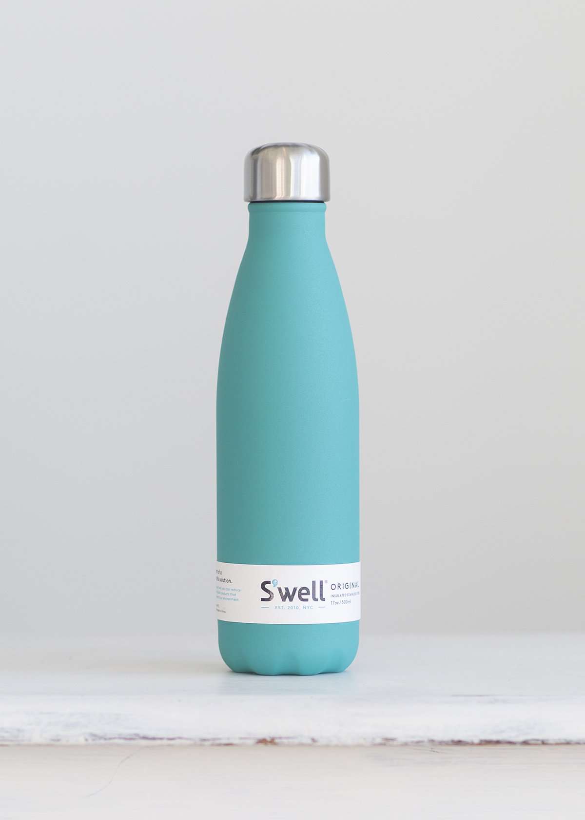 S'well water bottle in a teal-jade design and holds 17 oz.