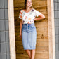 Modest cream tee with multi-colored floral detail 