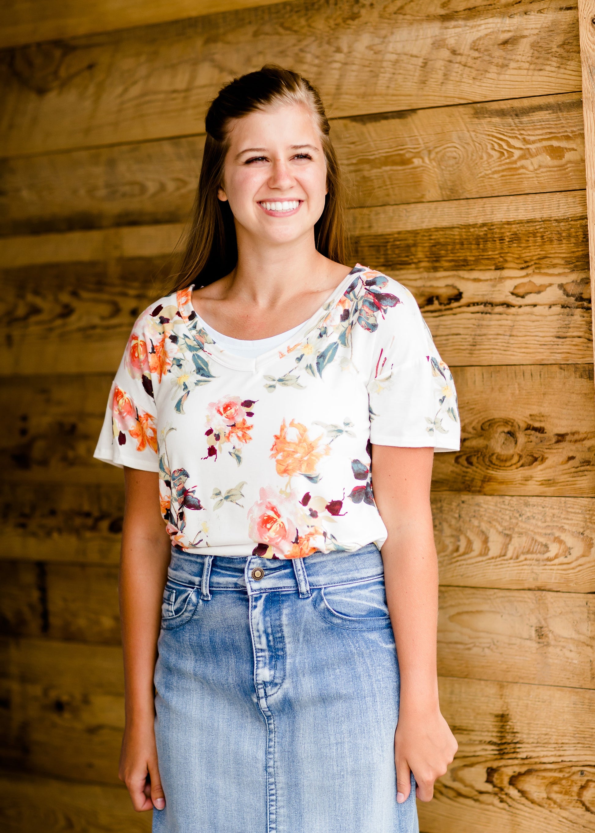 Modest cream tee with multi-colored floral detail 