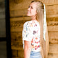 Modest cream tee with multi-colored floral detail 
