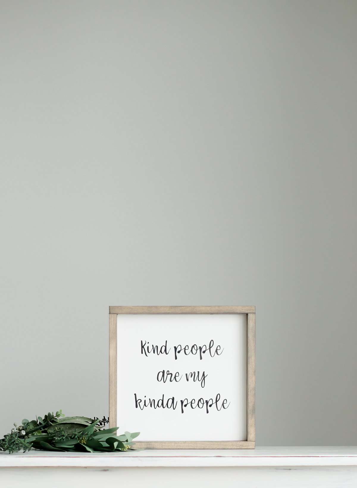 Wood Frame Signboard with the words, " kind people are my kinda people" written in a playful script font.