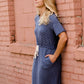 Navy dot knit midi dress with pockets and an adjustable waist