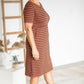 Meet Kristen. This Short sleeve Midi Dress was designed in-house and definitely isn't your typical cotton midi dress! This classic style is crafted with quality fabrics and needs no slip. The elastic waist and longer, short sleeves are extremely flattering and feminine. You will also love the placement of the two front pockets as well, this small patch style pocket hits just right!