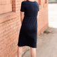 Meet Kristen. This Short sleeve Midi Dress was designed in-house and definitely isn't your typical cotton midi dress! This classic style is crafted with quality fabrics and needs no slip. The elastic waist and longer, short sleeves are extremely flattering and feminine. You will also love the placement of the two front pockets as well, this small patch style pocket hits just right!