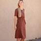 Meet Kristen. This Short sleeve Midi Dress was designed in-house and definitely isn't your typical cotton midi dress! This classic style is crafted with quality fabrics and needs no slip. The elastic waist and longer, short sleeves are extremely flattering and feminine. You will also love the placement of the two front pockets as well, this small patch style pocket hits just right!