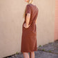 Meet Kristen. This Short sleeve Midi Dress was designed in-house and definitely isn't your typical cotton midi dress! This classic style is crafted with quality fabrics and needs no slip. The elastic waist and longer, short sleeves are extremely flattering and feminine. You will also love the placement of the two front pockets as well, this small patch style pocket hits just right!