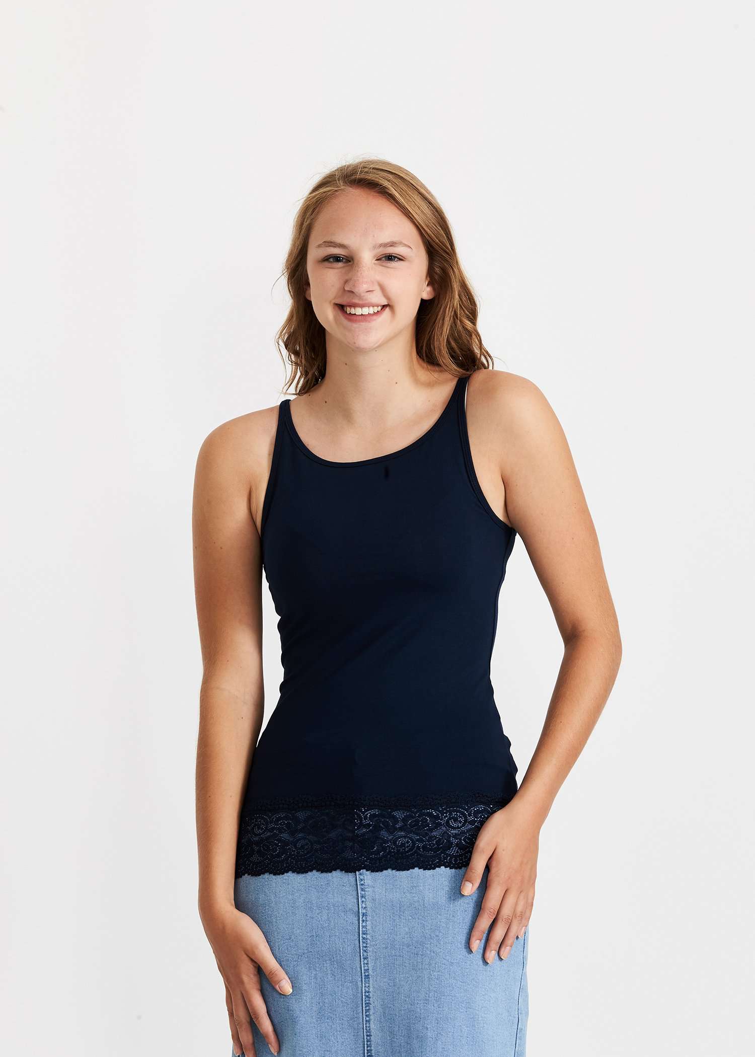 Reversible modest layering cami with lace at the bottom in white, black or navy color options.