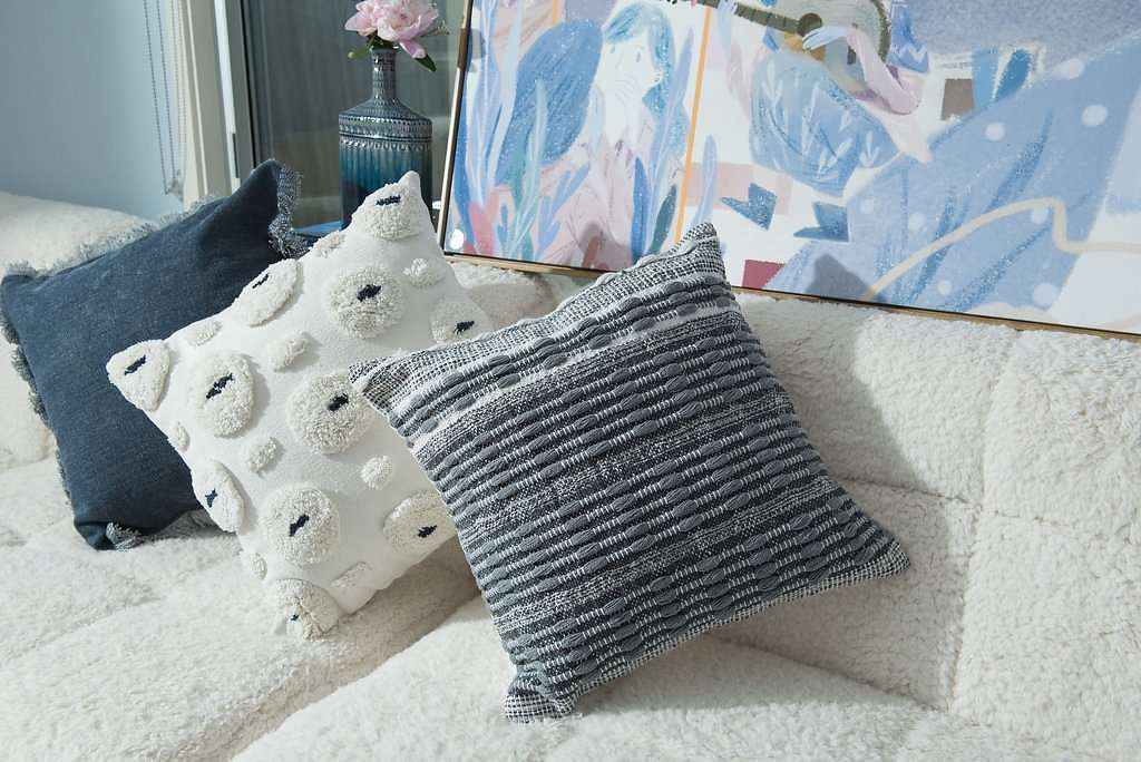 Bloom and Give Ivory Pillow with navy accent