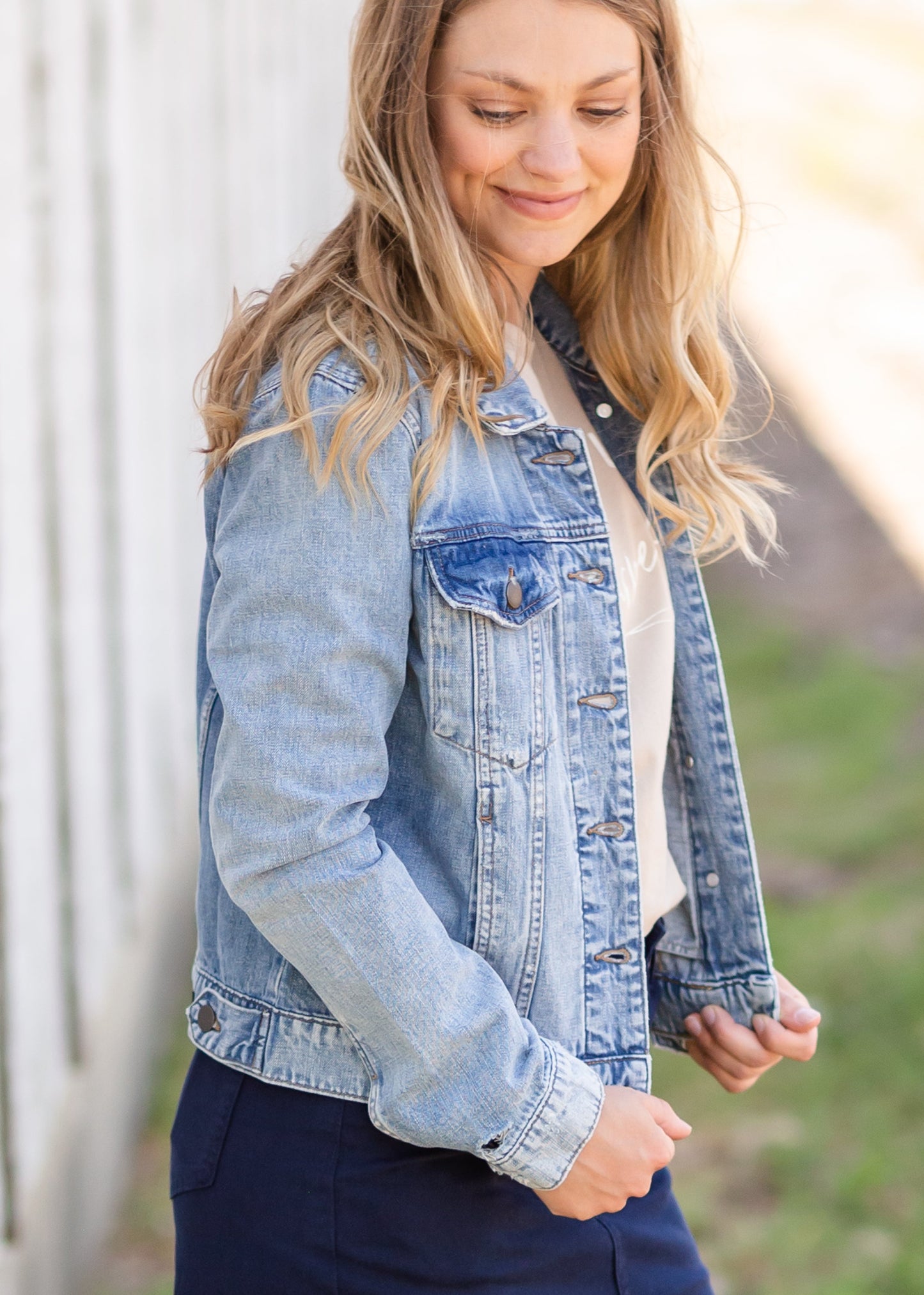 Fashionable, classic, soft and comfortable - no wardrobe essential is more of a style hero than this casual Light Wash Denim Jean Jacket. Pair this jacket with any bottoms, a basic tee, or cute blouse for a style that suits all. Made from soft 100% cotton fabric this denim jacket is designed to comfort all-day.