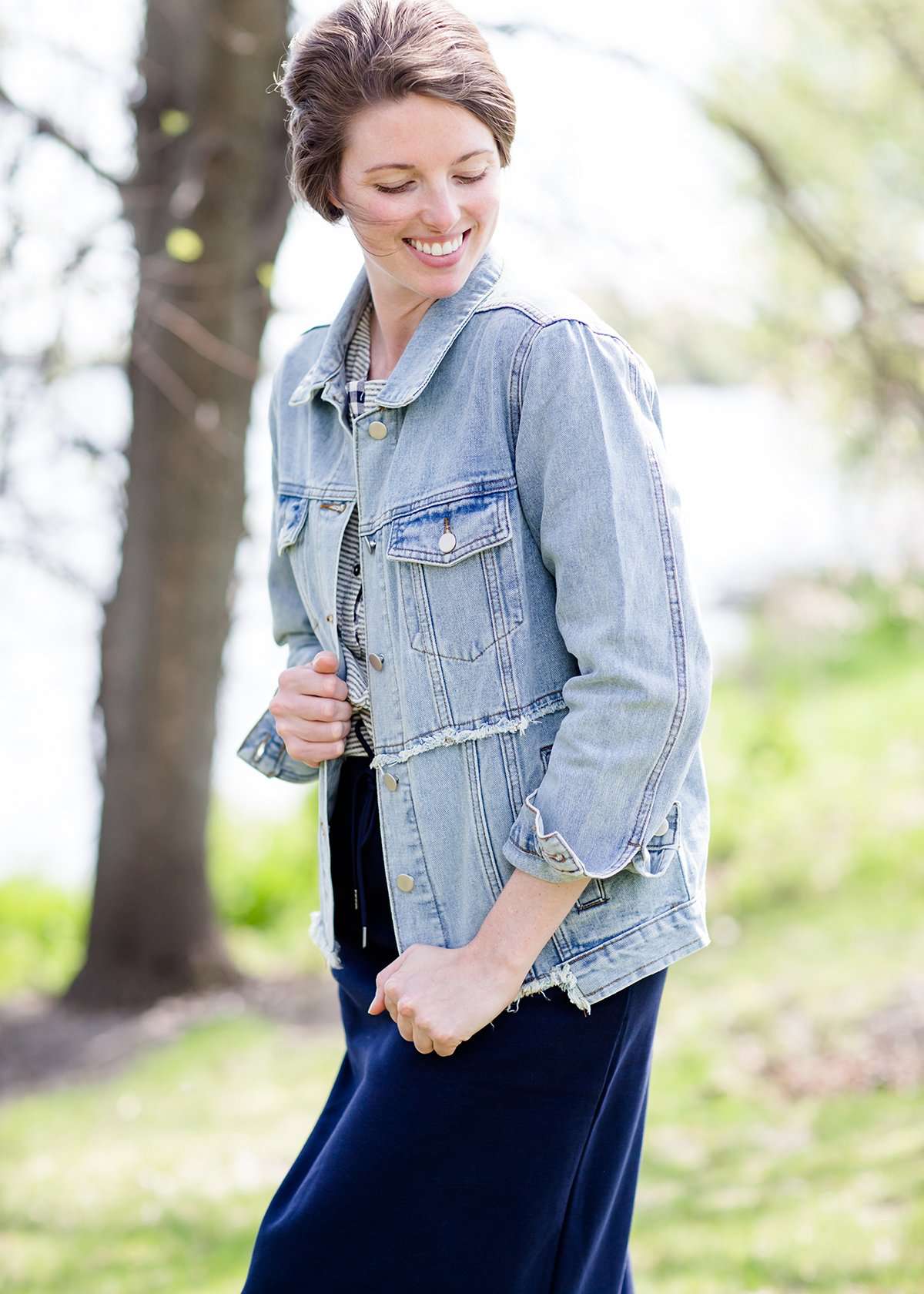 women's modest light denim distressed jean jacket