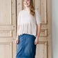 oatmeal colored 3/4 sleeve peplum style top