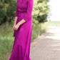 Women's long pink maxi dress that is fully lined, nursing friendly and comes with a belt