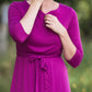 Women's long pink maxi dress that is fully lined, nursing friendly and comes with a belt