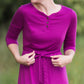 Women's long pink maxi dress that is fully lined, nursing friendly and comes with a belt