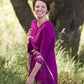 Women's long pink maxi dress that is fully lined, nursing friendly and comes with a belt