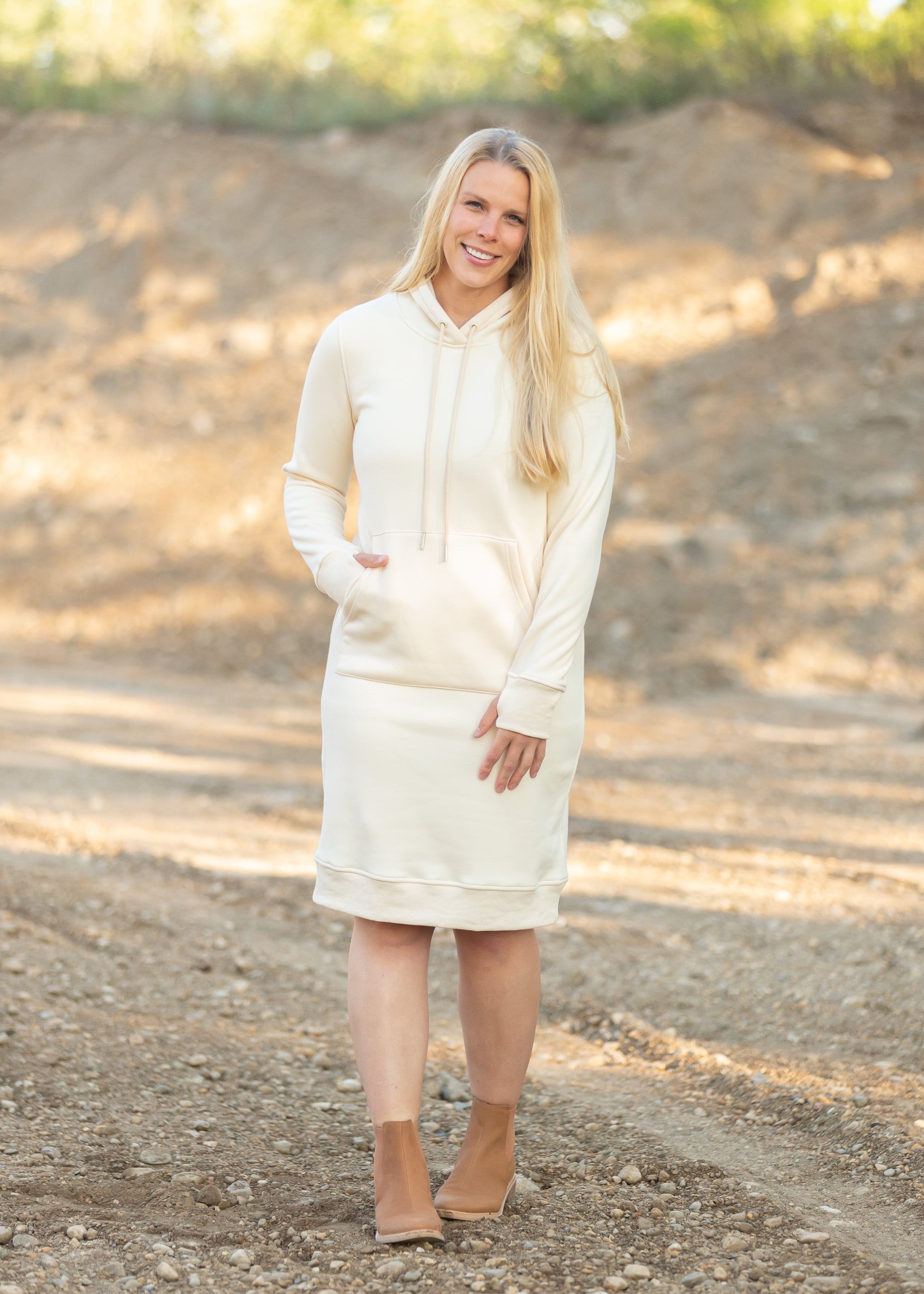 The Marti Sweatshirt Midi Dress is an Inherit Design we made for all your cozy activities! This dress will be great for snuggling up on the couch, heading out during cooler weather or paired with leggings for work! It is super fuzzy on the inside with an elevated, quality fabric on the outside with a kangaroo pocket. There are wide ribbed hems on the bottom and on the cuffs with thumb holes!