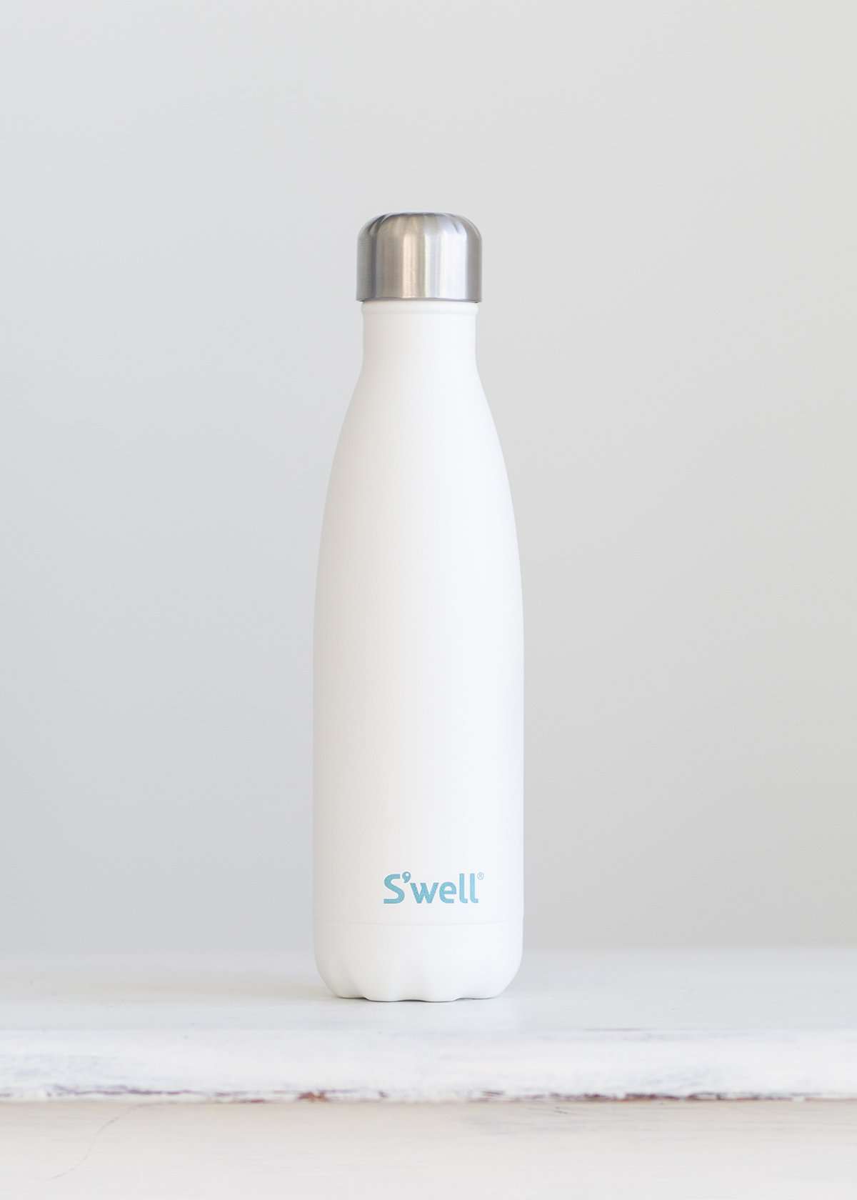 S'well water bottle in a white design and holds 17 oz.