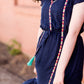Navy midi dress with colorful embroidered accents 