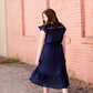 Navy midi dress with colorful embroidered accents 