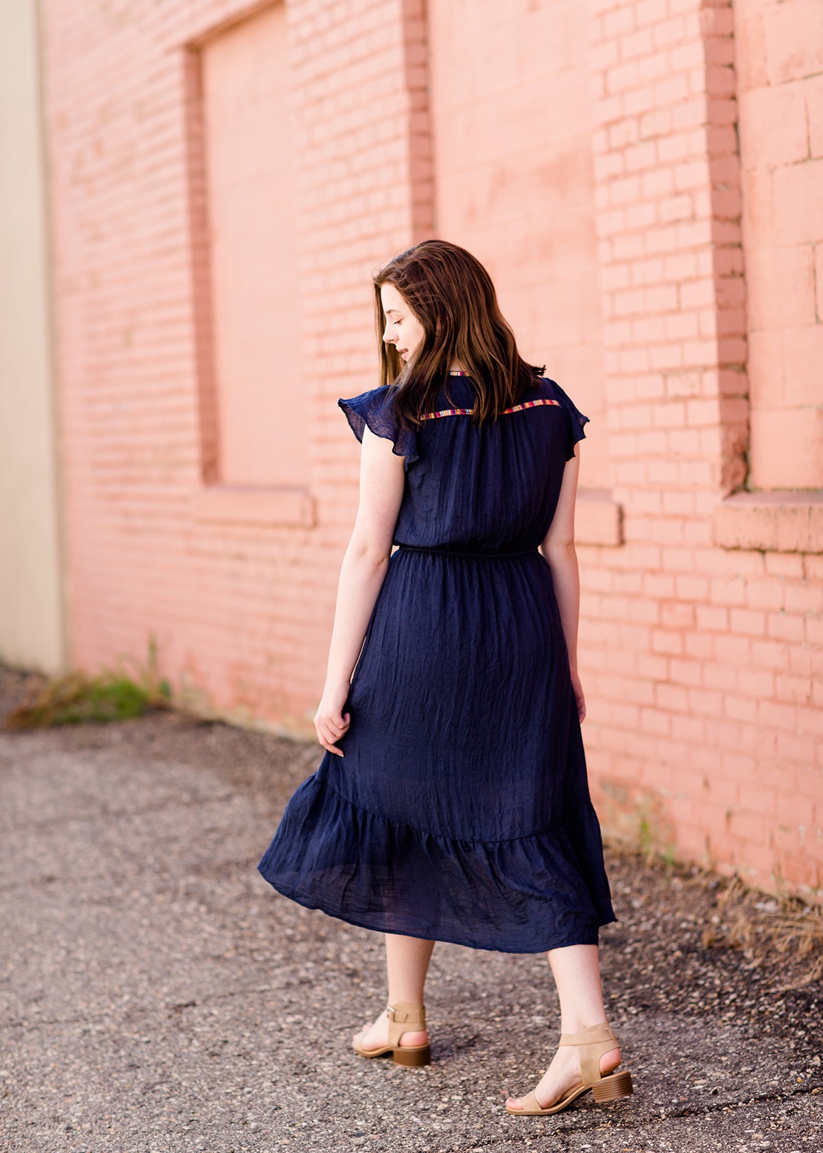 Navy midi dress with colorful embroidered accents 