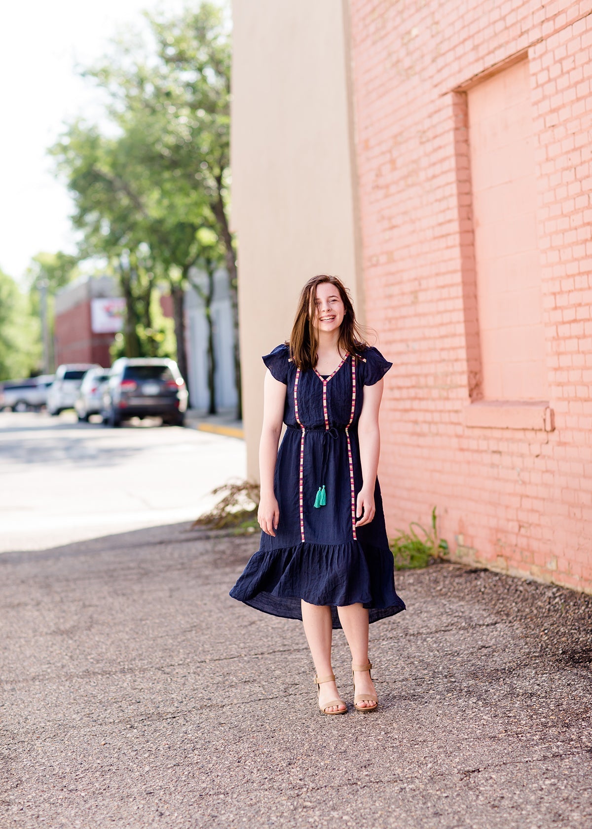 Navy midi dress with colorful embroidered accents 