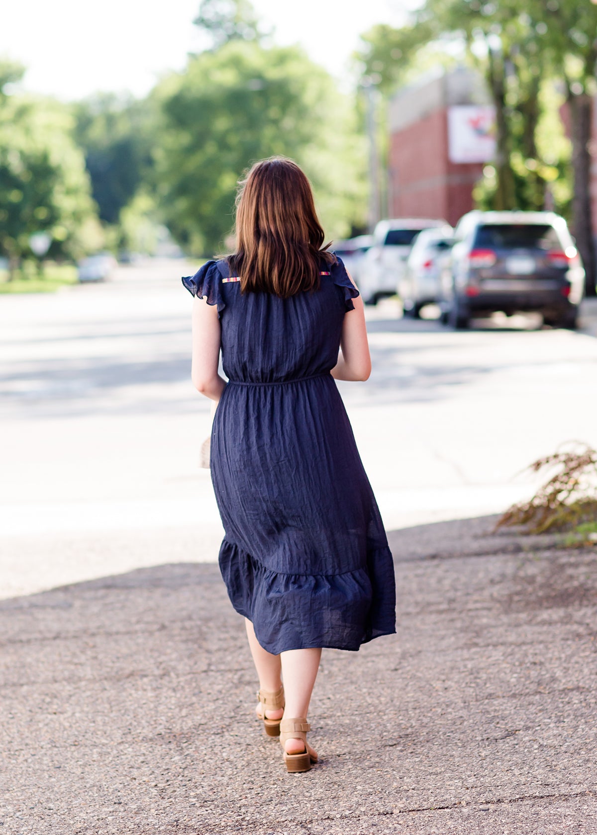 Navy midi dress with colorful embroidered accents 