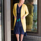 Navy midi dress with colorful embroidered accents 