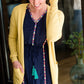 Navy midi dress with colorful embroidered accents 