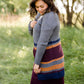 Long knit charcoal womens cardigan with orange and burgundy stripes