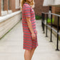 women's mauve midi dress with black and white stripes and side pockets