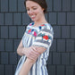 women's modest blue and white striped top with embroidered flowers