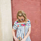 women's modest blue and white striped top with embroidered flowers