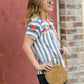 women's modest blue and white striped top with embroidered flowers