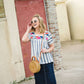 women's modest blue and white striped top with embroidered flowers